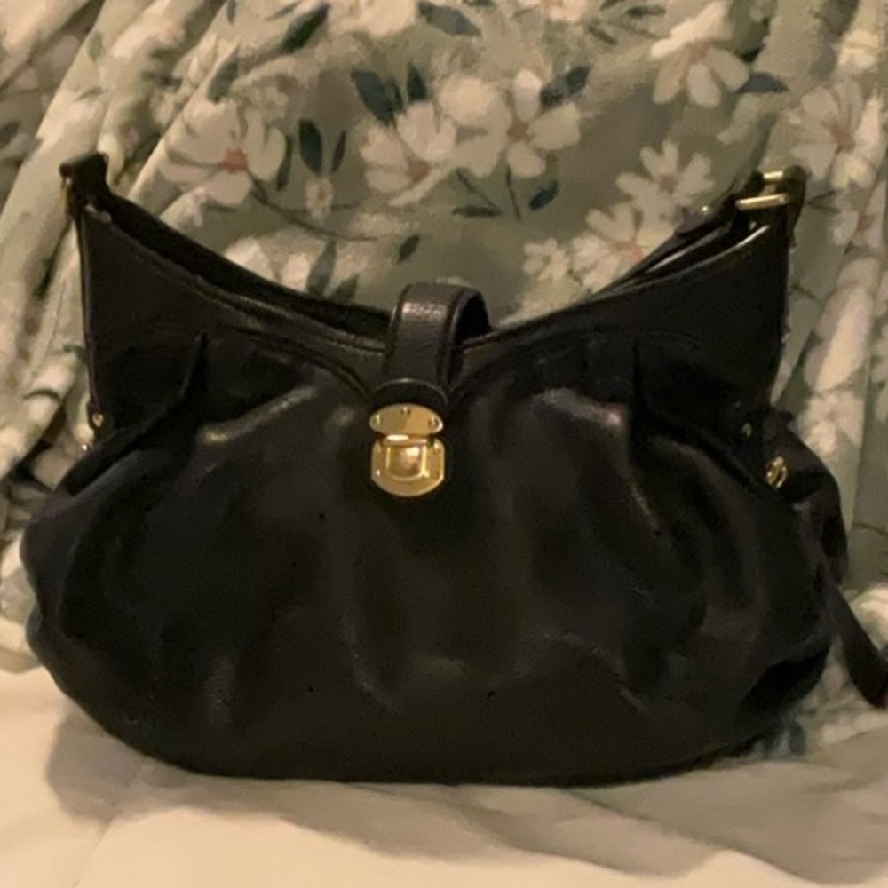 Authentic Louis Vuitton Mahina XS Monogram Black Leather Shoulder Bag.
